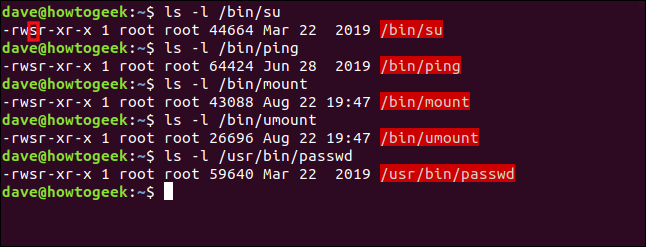 Uma lista de comandos do Linux que têm seu bit SUID definido em uma janela de terminal.