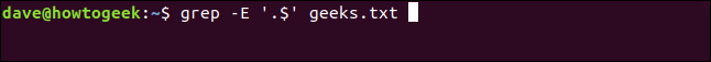O comando "grep -E '. $' Geeks.txt" em uma janela de terminal.
