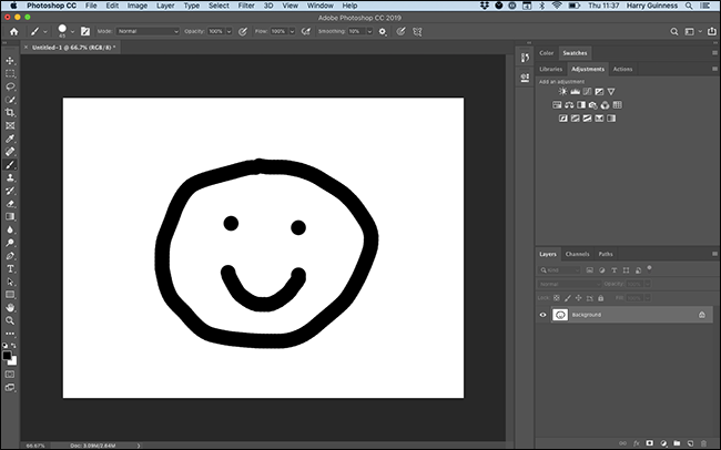 A pintura de um smiley no Photoshop.