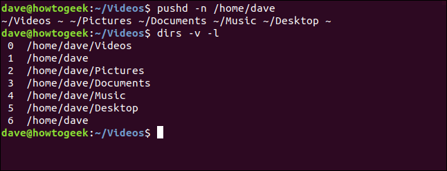 Os comandos "pushd -n / home / dave" e "dirs -v -l" em uma janela de terminal.