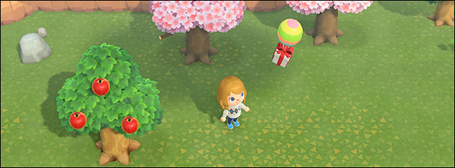 Abatendo um balão com um estilingue em Animal Crossing.