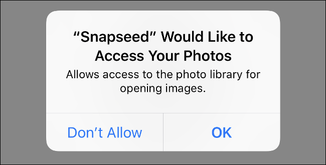 Uma captura de tela do aplicativo iOS "Snapseed" solicitando acesso ao aplicativo Fotos
