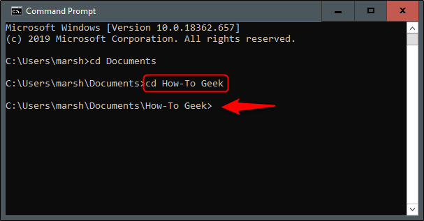 O comando "cd How-To Geek" no prompt de comando.