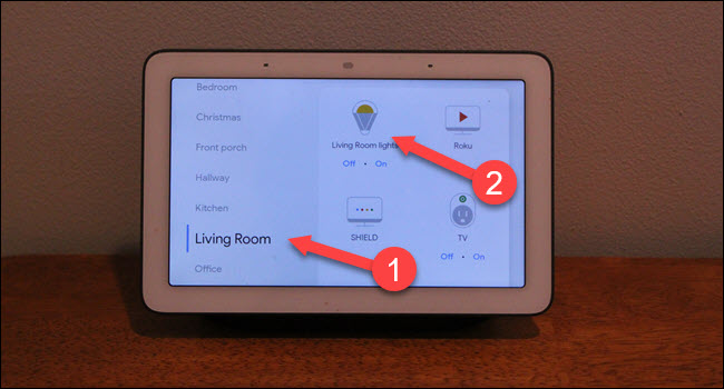 Caixa de diálogo das salas do Google Home com setas apontando para salas de estar e as luzes.