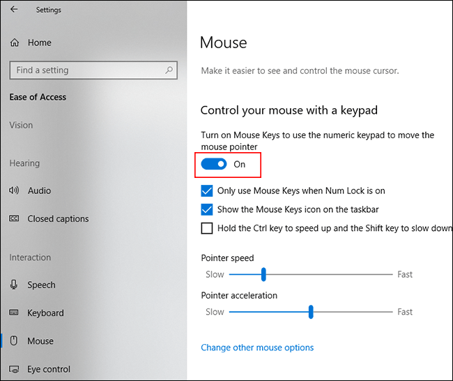 Na seção Mouse do menu Windows Ease of Access, clique no controle deslizante para ativar as teclas para mouse