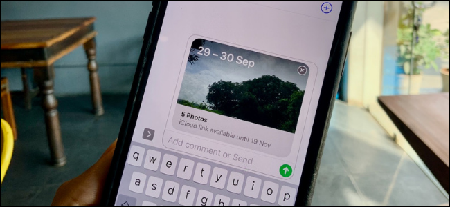 Um link do iCloud para compartilhar fotos no aplicativo Mensagens em um iPhone.