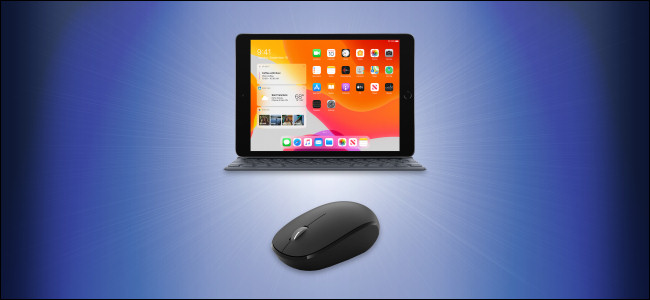 Um iPad com teclado e mouse.