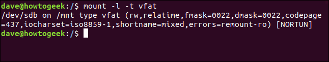 montar com a opção -l label em uma janela de terminal