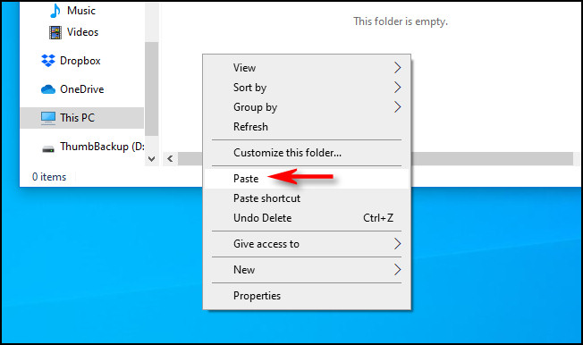 Na janela de destino, clique com o botão direito e selecione "Colar" no menu pop-up do Windows 10.