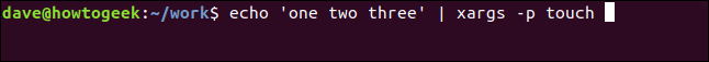 echo 'um dois três' |  xargs -p touch em uma janela de terminal