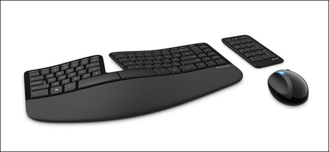 Escultura sem fio da Microsoft, teclado ergonômico, teclado numérico e mouse.