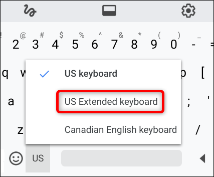 No teclado na tela, clique na entrada de idioma (EUA) e escolha Teclado americano estendido