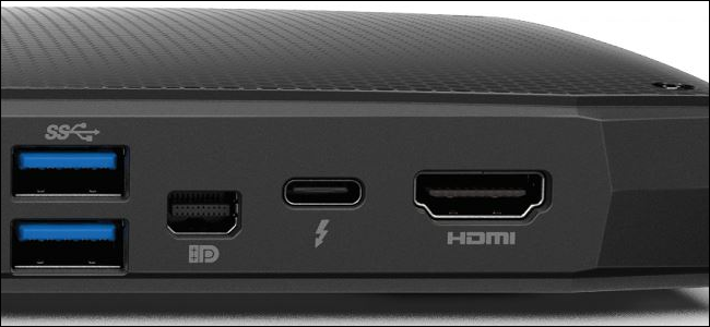 Um close-up das portas do laptop, incluindo (da esquerda) HDMI, Thunderbolt 3, DisplayPort e portas USB duplas.