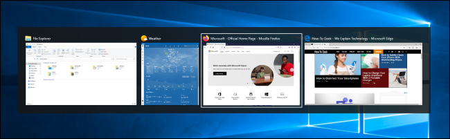 Quatro miniaturas de janelas abertas no Windows 10 Task Switcher.