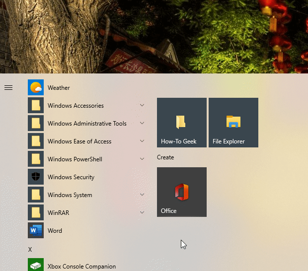 Um GIF animado do "File Explorer" sendo arrastado do menu Iniciar para a área de trabalho para criar um atalho.