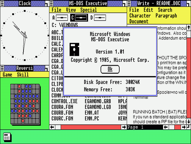 A área de trabalho do Windows 1.0 com muitos aplicativos lado a lado abertos.