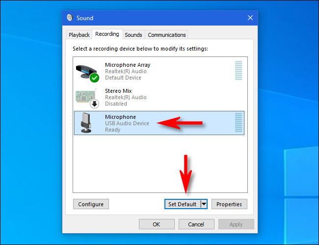 No Windows 10, clique no microfone na lista e clique no botão "Definir padrão".