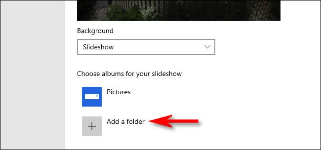 Depois de selecionar "Apresentação de slides", você pode adicionar uma pasta de imagens para usar como apresentação de slides da tela de bloqueio.
