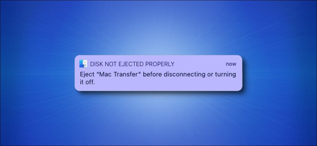 A mensagem de aviso "Disco não ejetado corretamente" do Apple Mac em um fundo azul.