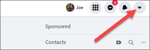 Clique na seta no canto superior direito do Facebook.com.