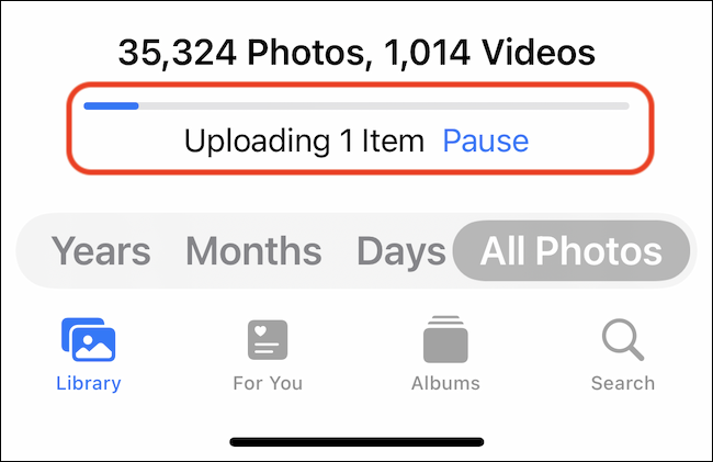 A barra de progresso do upload no aplicativo Fotos. 