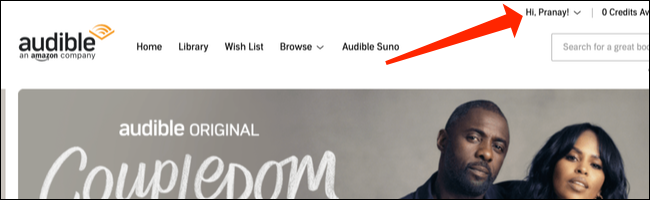 Na parte superior da página inicial do Audible, clique no menu suspenso denominado: "Olá, [NOME]!"