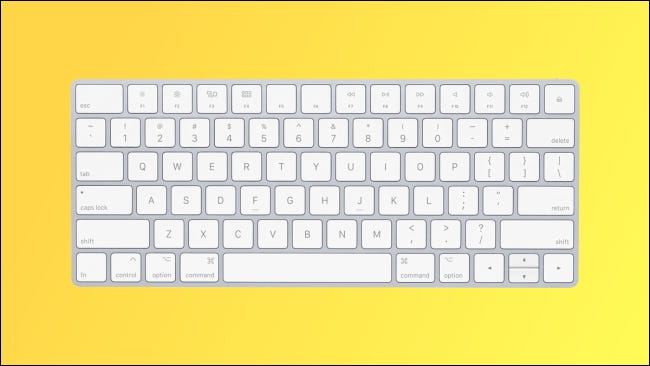 Teclado Apple Mage em fundo amarelo