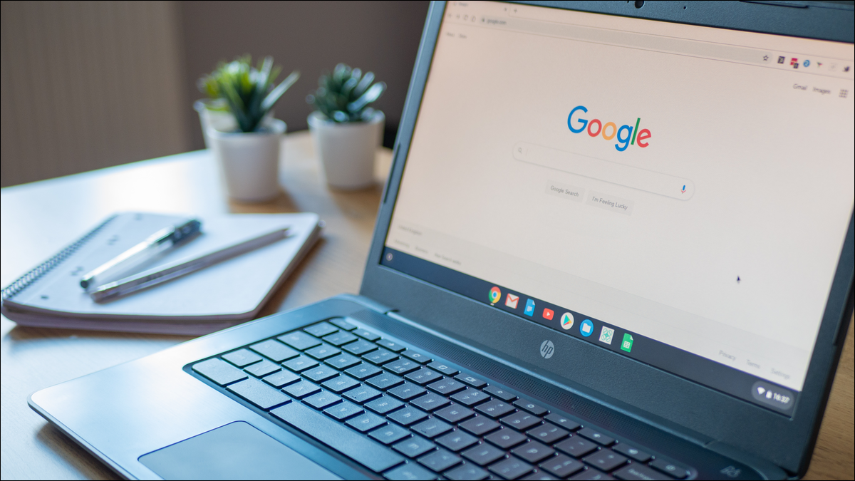 Chromebook sitting on a desk with Google's website on-screen