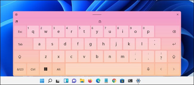 O tema do teclado de toque "Rosa-Laranja" no Windows 11.
