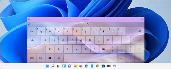 Um teclado de toque do Windows 11 com um tema aplicado.