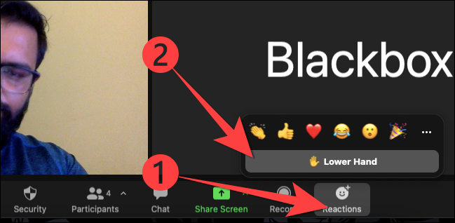 Selecione o botão "Reações" e escolha a opção "Abaixar a mão" para abaixar a mão no aplicativo Zoom para desktop.