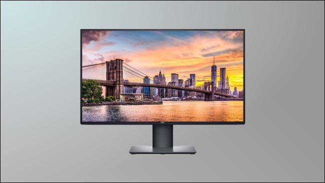 dell ultrasharp em fundo cinza