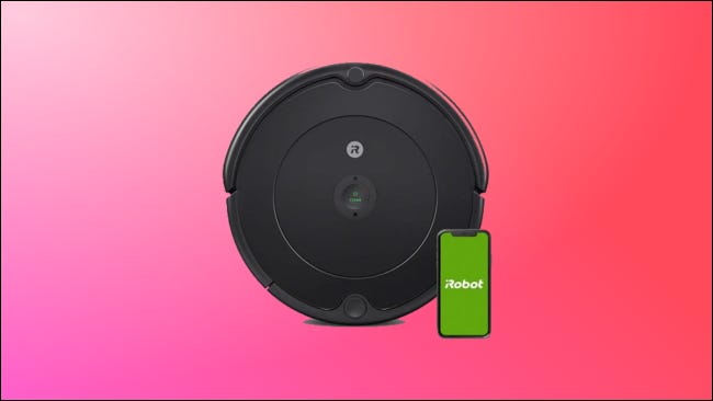 Roomba 694 em fundo rosa