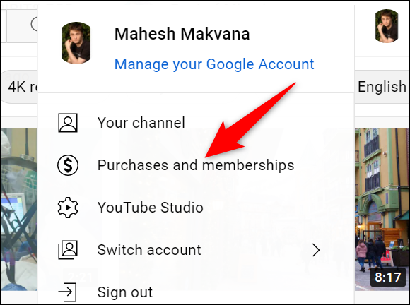 Selecione "Compras e assinaturas" no menu do perfil no site do YouTube.