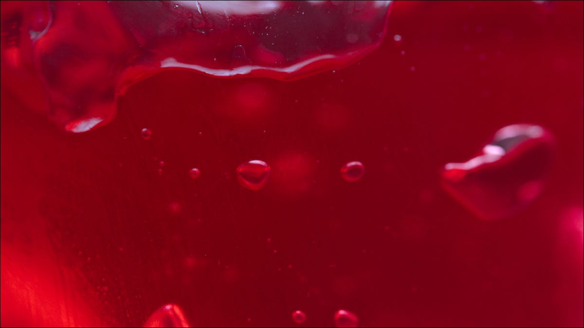 Textura de gelatina vermelha com bolhas de ar