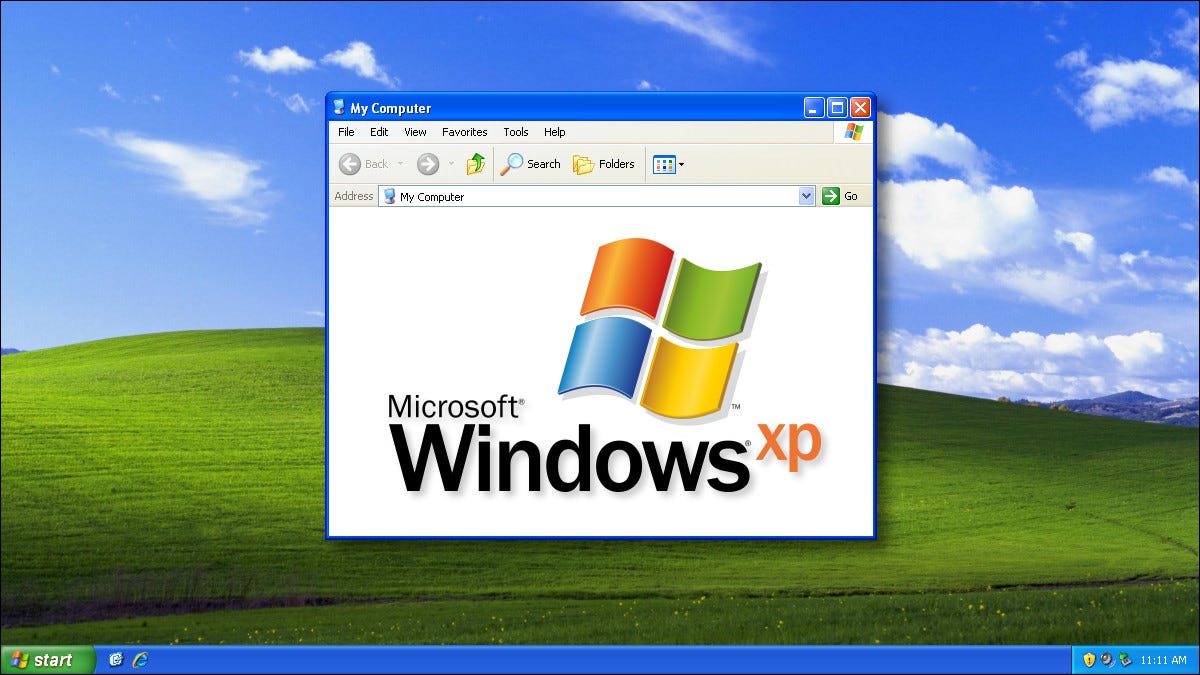 Logotipo do Windows XP no plano de fundo Bliss