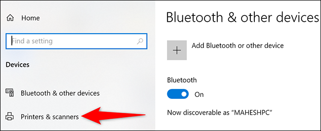 Selecione "Impressoras e Scanners" na barra lateral esquerda da página "Dispositivos".