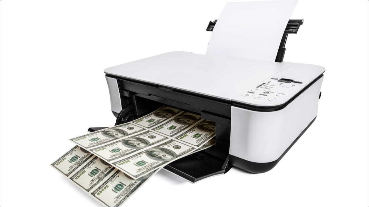 Uma impressora jato de tinta imprimindo notas de dólar.
