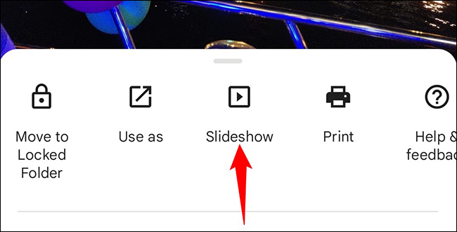 Selecione "Apresentação de slides" no menu de fotos.