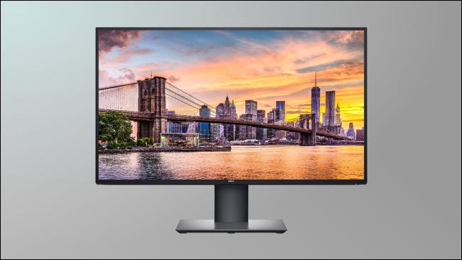 Monitor Dell Ultrasharp em fundo cinza