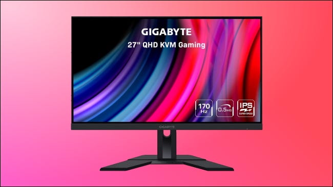 Monitor Gigabyte em fundo rosa