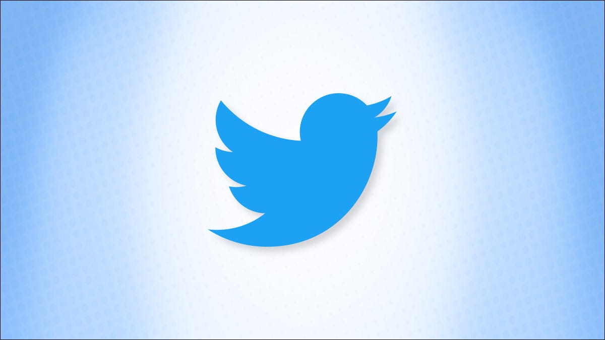 O logotipo do twitter em um fundo azul