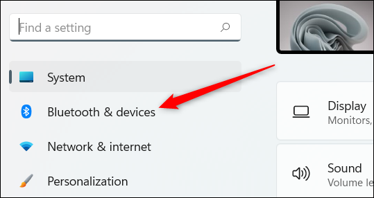 A opção Bluetooth e Dispositivos.