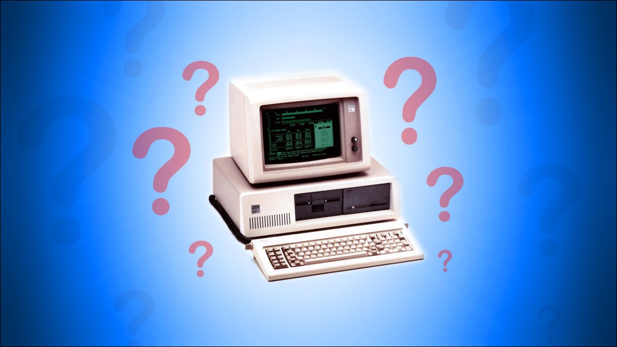 Um IBM PC com pontos de interrogação ao redor em um fundo azul