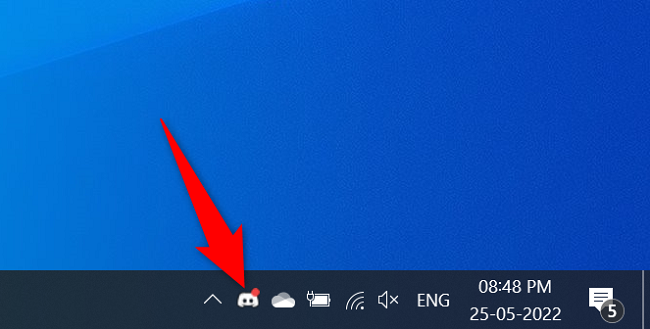 Encontre o Discord na bandeja do sistema.