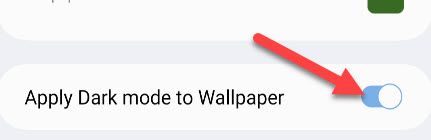 Ative "Aplicar modo escuro ao papel de parede".