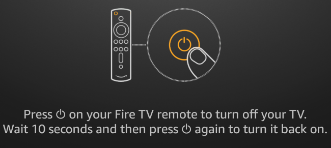 Pressione o botão liga / desliga no controle remoto Fire TV Stick.
