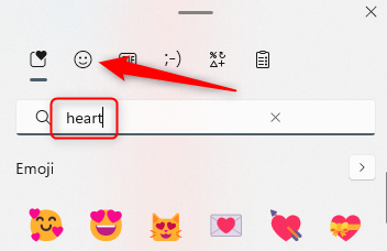 Clique em Emoji ou digite coração.