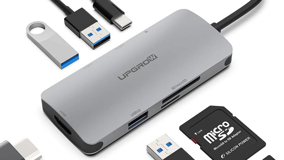 Hub UPGROW USB-C com uma variedade de cabos e cartões SD/TF ao seu redor