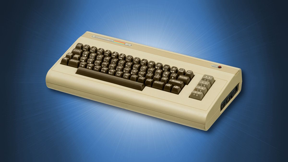 Um computador doméstico Commodore 64 em um fundo azul
